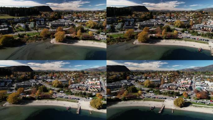 瓦纳卡镇秋天的美丽色彩，湖边有酒店和餐馆。新西兰航空