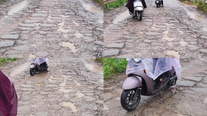 摩托车开过坑洼道路泥巴路摩托车通过排骨路