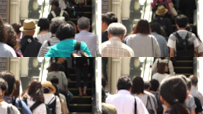 日本，东京:扶梯上的人群。