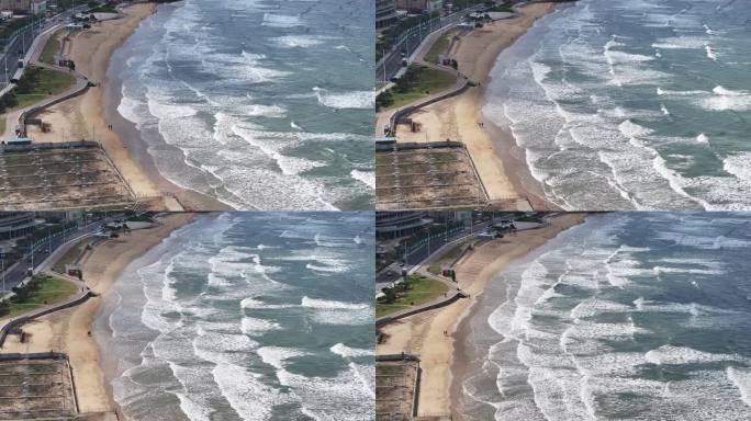 航拍威海金海滩海水浴场秋季的沙滩海浪