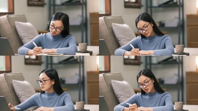 年轻的成年亚洲女学生在家里用笔记本电脑做笔记。亚洲女性在线学习听力虚拟视频通话。商业和教育理念。