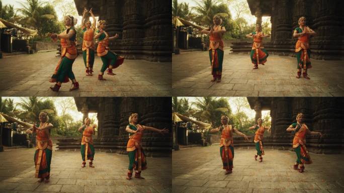 穿着传统服装的印度妇女穿着五颜六色的纱丽跳舞的慢动作肖像。三位富有表现力的年轻女性在古庙中表演民间舞
