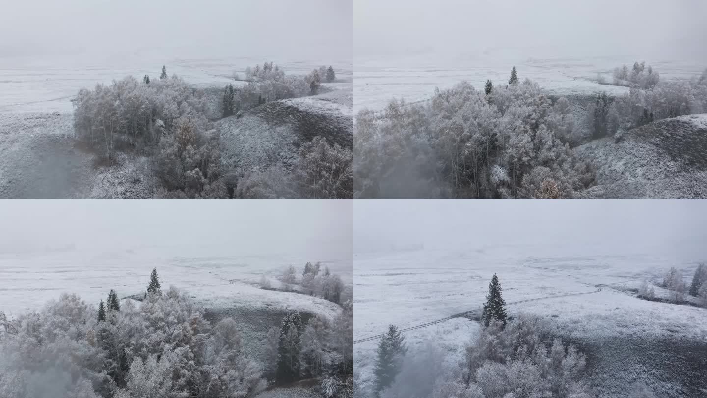 航拍雪中的新疆禾木村草原