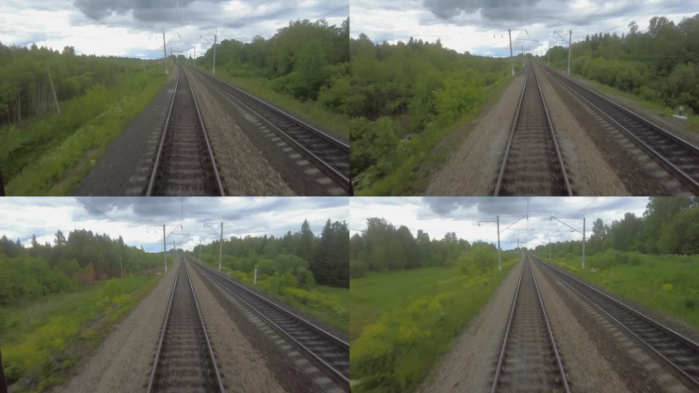 从一列驶离的客运列车的窗口看到的铁路轨道。