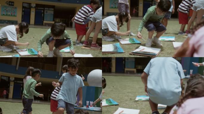 热情的小学生喜欢和他们的朋友在纸上练习画画。来自不同国家的学生