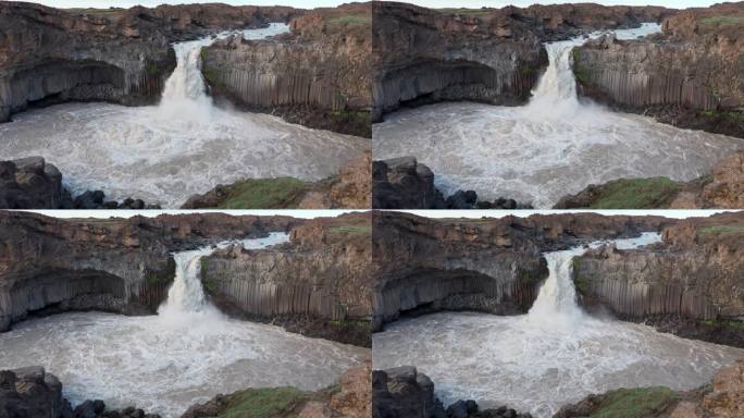 冰岛夏季，强大的阿尔德雅福斯瀑布从巴达达尔山熔岩场和玄武岩柱流出