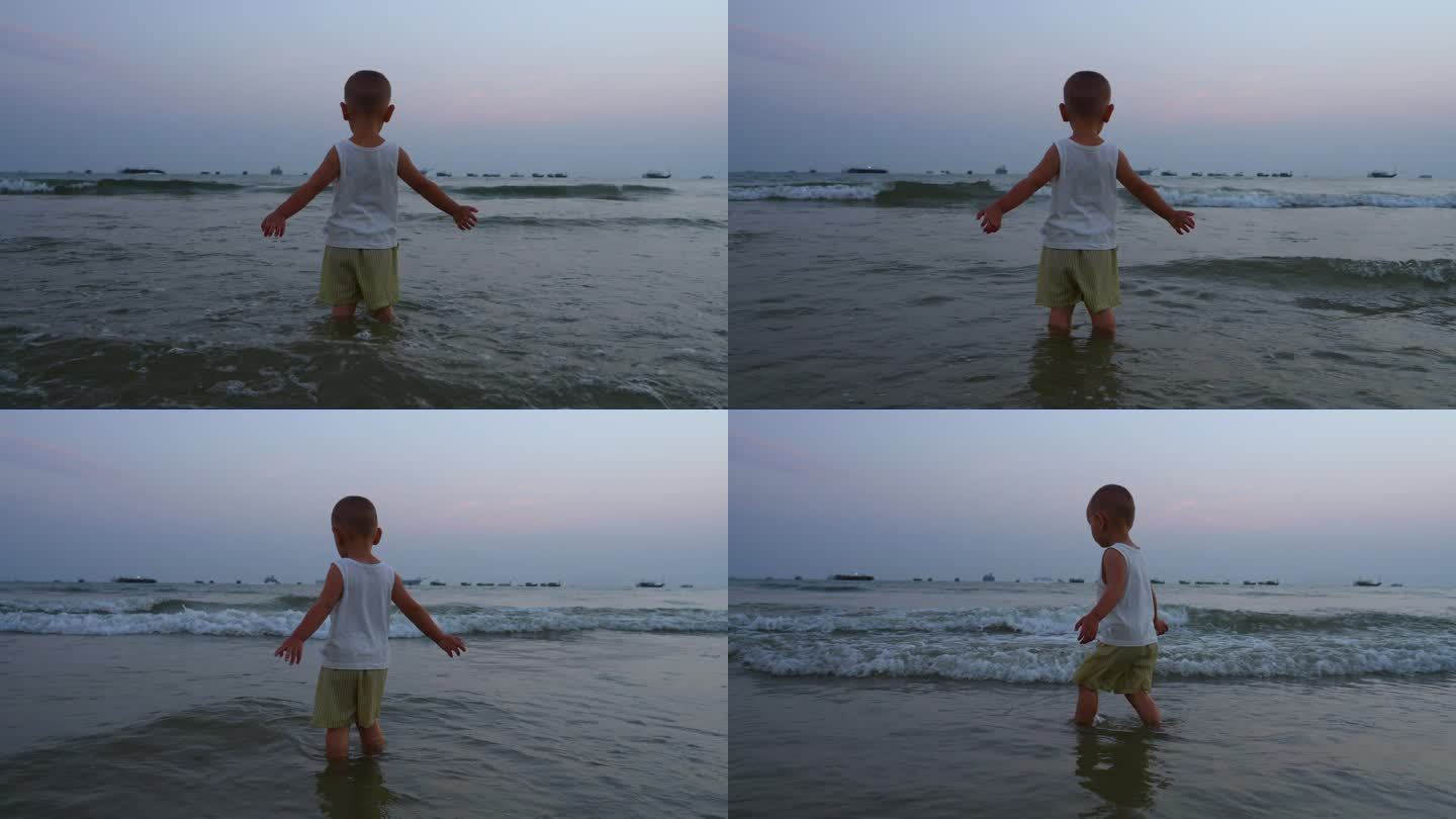 小男孩勇敢面对海浪-小孩站在海边张开双臂