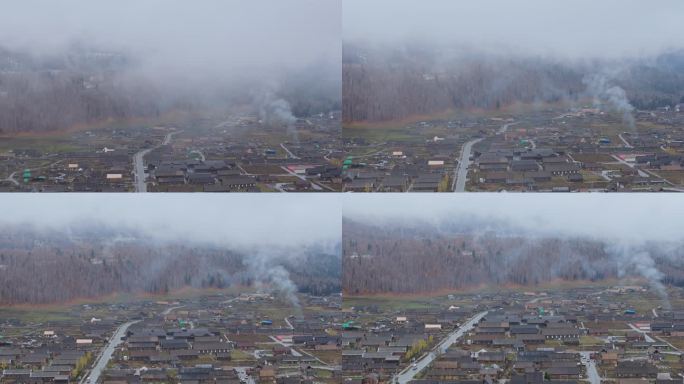 航拍秋天晨雾中的新疆禾木村风景