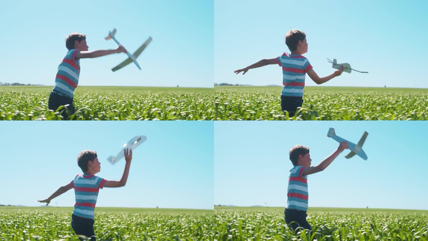 飞机，玩具和孩子在田野里散步，在乡下的农场里玩游戏。驾驶飞机，梦想与孩子在大自然中旅行，在绿色的花园