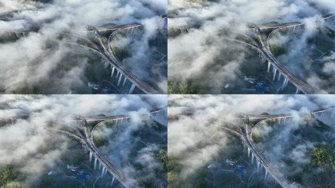 航拍山区云海中的高速立交桥4K