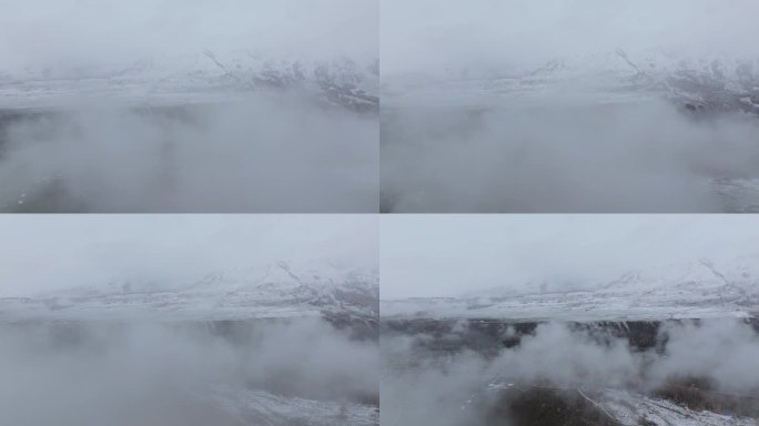 航拍冬天雪山下的新疆禾木村
