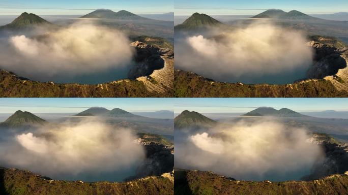 鸟瞰图环绕卡瓦伊真火山，火山口上有烟雾，绿松石湖，印度尼西亚爪哇一座活火山的硫磺开采