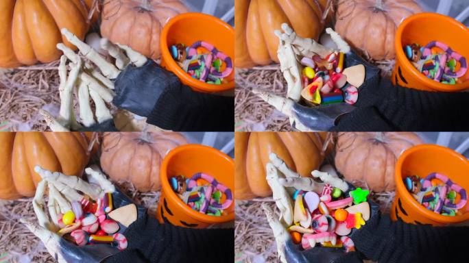 近距离看，可怕的怪物用手在桶里收集糖果，令人毛骨悚然的儿童游戏“不给糖就捣蛋”，
