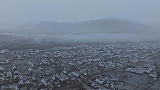 新疆禾木村雪景晨雾航拍