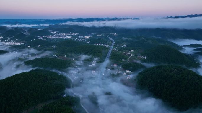 航拍山区云海中的高速立交桥4K