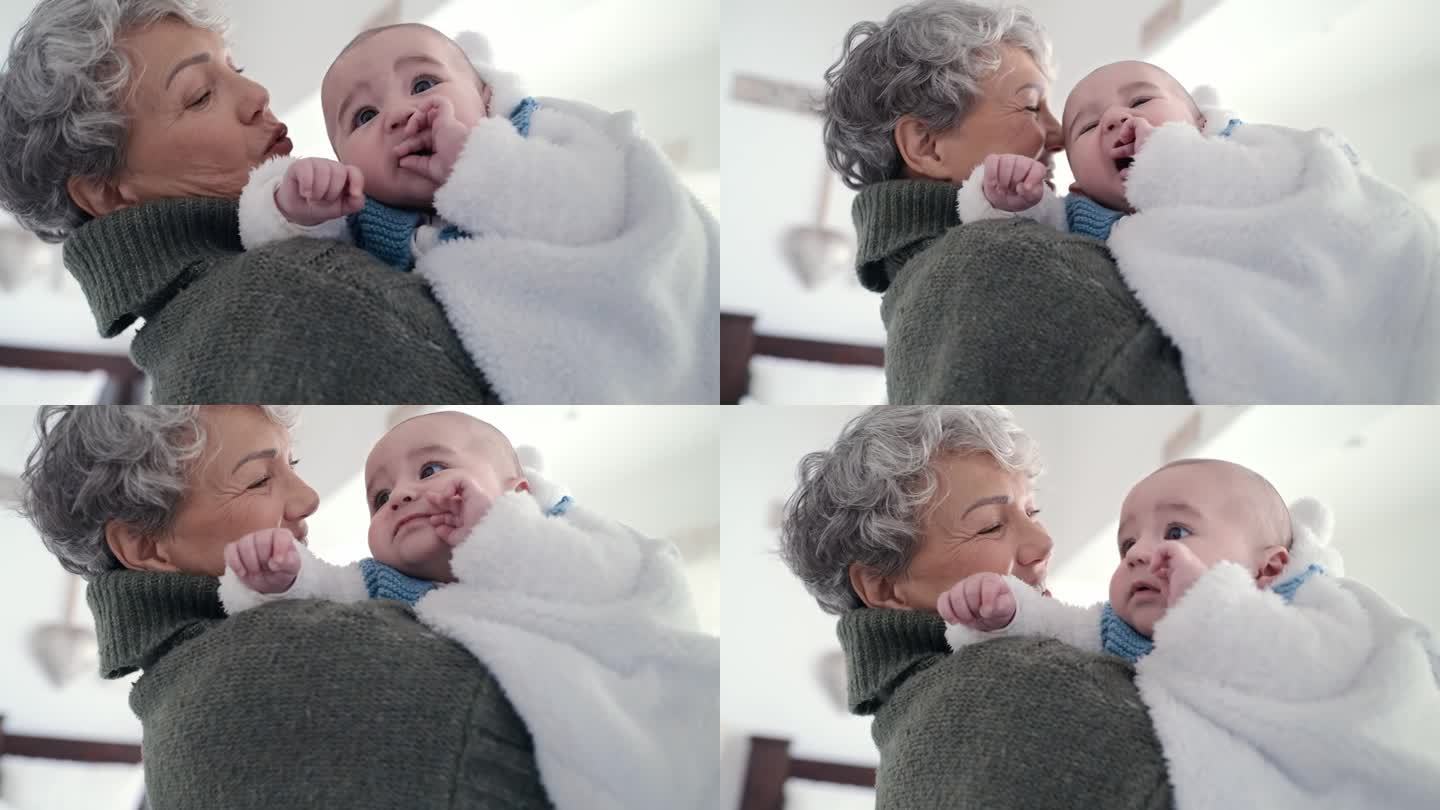 老人，妇女和抱着婴儿微笑，拥抱和家庭纽带在卧室或托儿所。老人、人、新生儿为儿童的发展与拥抱，爱与关怀