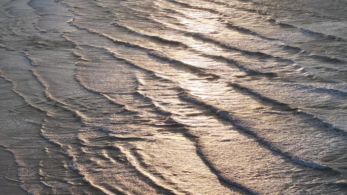 航拍威海金海滩海水浴场落日晚霞沙滩海浪