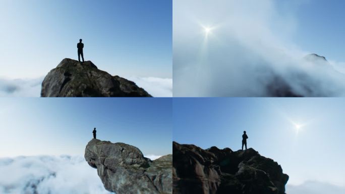 山顶登顶成功男人背影人生巅峰展望未来