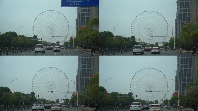 汽车窗外摩天轮风景道路交通城市建筑风光