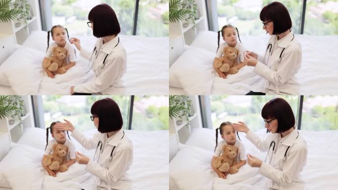 小女孩坐在床上，护士在给她量体温