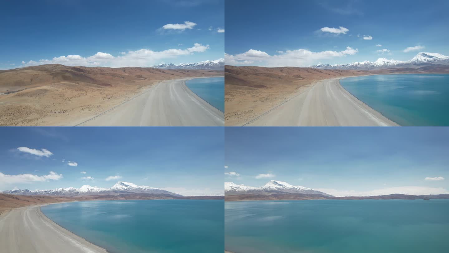 左山丘 右湖泊 中间是公路 西藏航拍