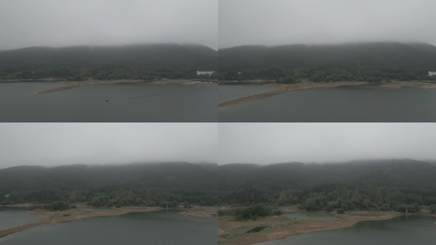 雨雾中穿梭航拍湖边群山（灰度视频可调色）