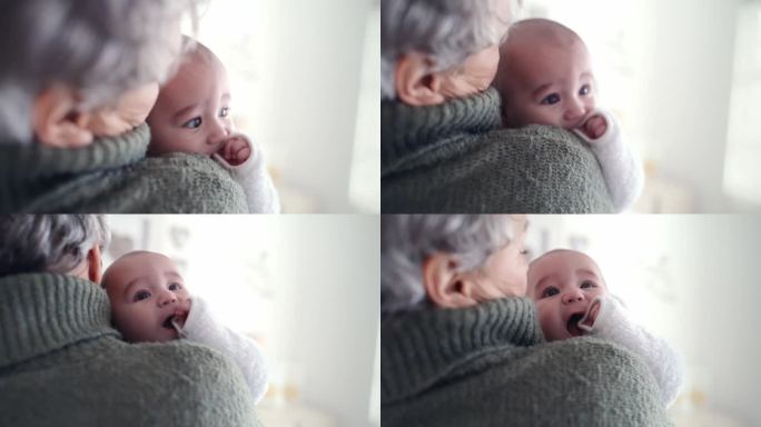 老人，妇女和抱着婴儿拥抱，放松和家庭纽带在卧室或托儿所。老人，人或新生儿拥抱孩子的发展，爱和照顾与退