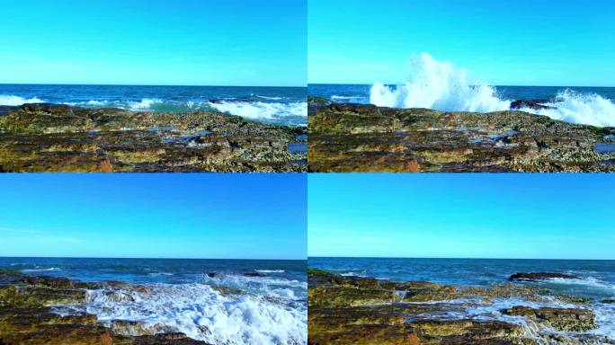 浪花拍打海岸礁石