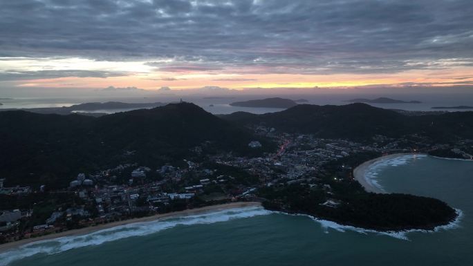 航拍泰国普吉岛卡伦海滩地区城镇日出风光