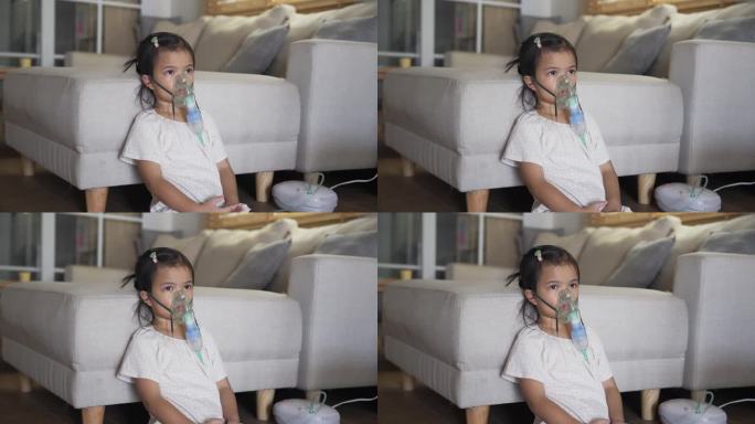 生病的孩子在家里使用医用吸入器口罩进行自我雾化治疗