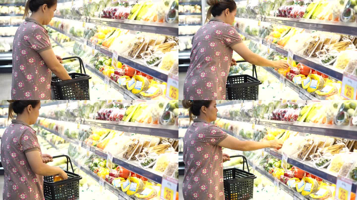 母亲和儿子正在超市购物。