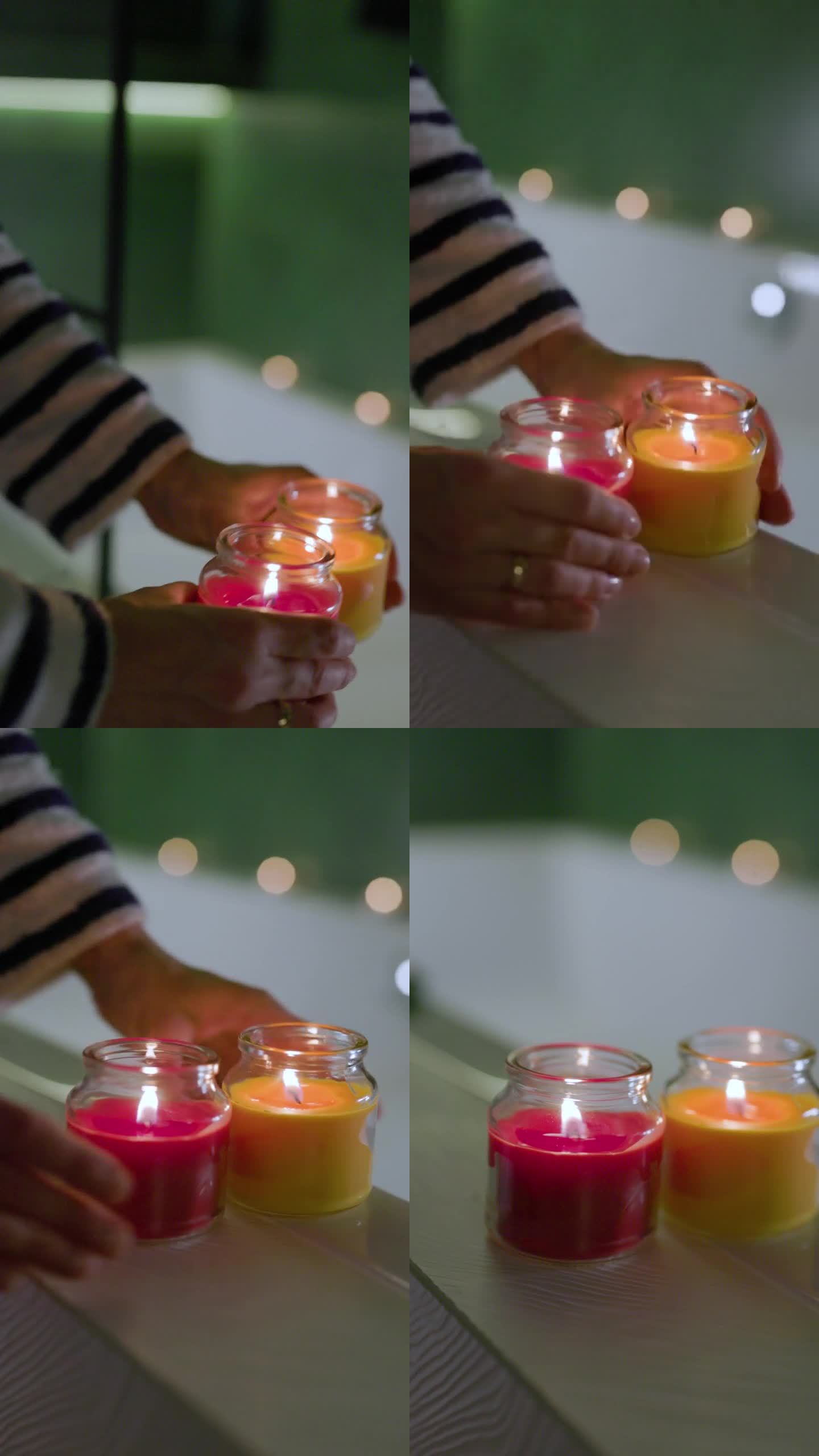 女人在浴缸边上放了两支香薰蜡烛