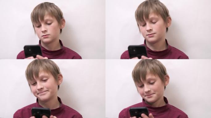 悲伤的少年用手机和女友聊天。单恋，尴尬的年龄。青少年在家里用智能手机打短信。2月14日情人节浪漫。在