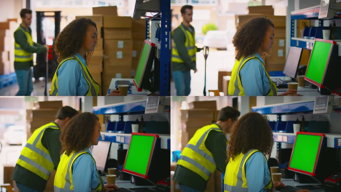 配货仓库中使用电脑终端和搬运箱子的男女工人