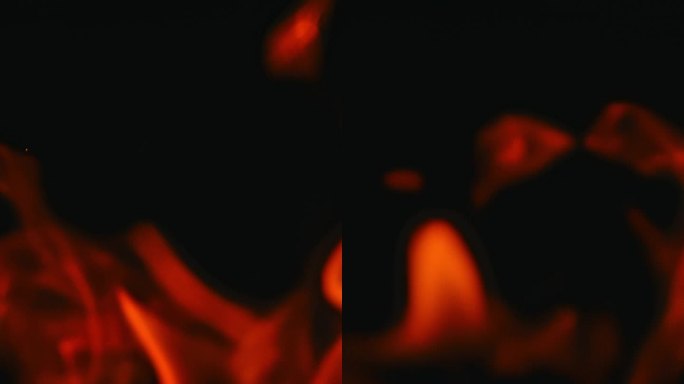 黑色背景上的火焰火苗火种视频背景