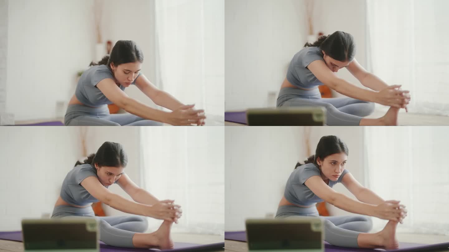 现代生活方式:在线瑜伽课在笔记本电脑上的健康和灵活性。