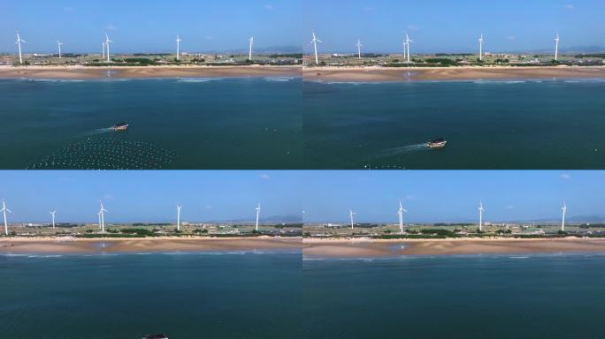 海边的风车和渔船