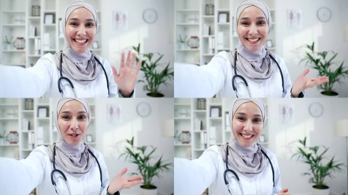 POV智能手机前置摄像头视图。快乐的穆斯林女医生在医院诊所视频通话