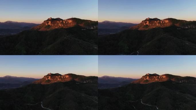 环绕拍摄晨光照在山峰上