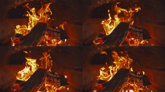 火焰:壁炉里燃烧的木头发出的火焰