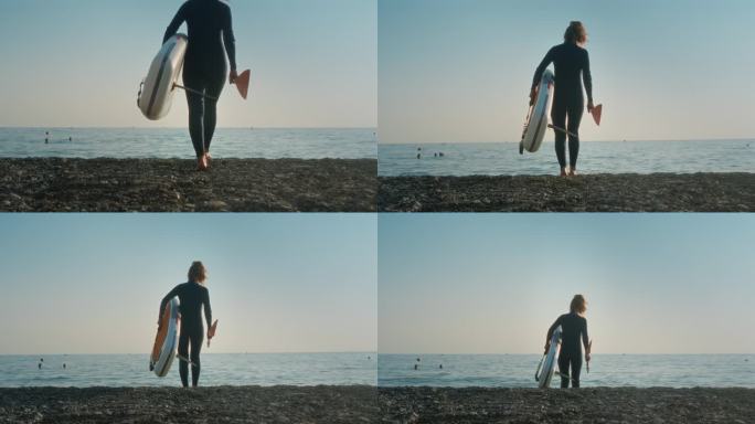 沙滩上一位身穿潜水服的老年妇女手持桨板入水。一位年长的女性在冲浪
