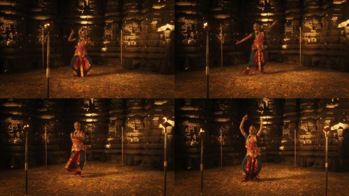年轻活力的印度妇女在烛光照亮的寺庙里表演传统民间舞蹈的慢动作肖像。在历史和精神遗址中展示迷人的文化