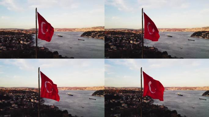 土耳其国旗在风中飘扬，背景是博斯普鲁斯河