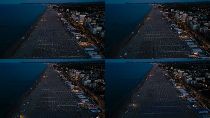 无人机拍摄的里米尼夜晚空旷的海滩。意大利，艾米利亚·罗马涅