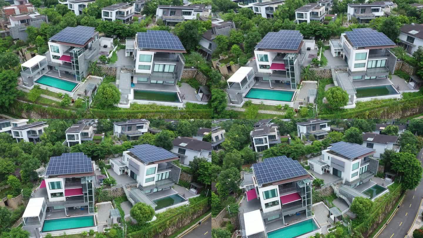 山上有太阳能电池板的绿色住宅