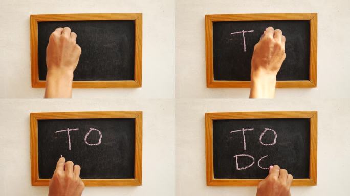一名男子在一块黑色黑板上写着“TO DO”。4 k。