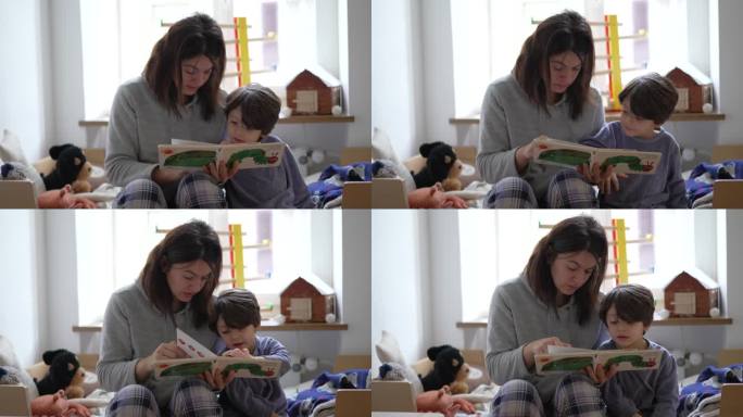 真实的卧室场景，妈妈给小儿子讲故事，与妈妈和书坦诚的育儿时刻