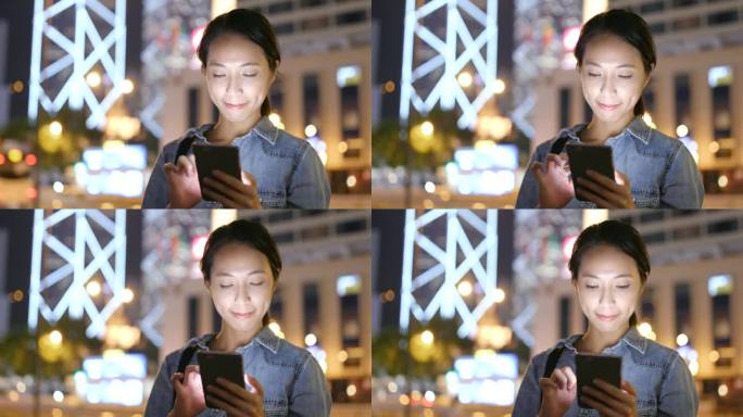 亚洲妇女在香港使用流动电话