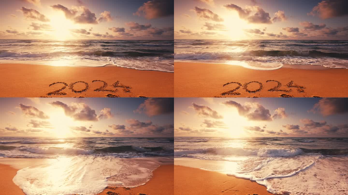 海面上的日出和迎接2024年新年的文字写在沙滩岸边的沙子为自然背景