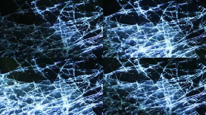 LED灯照射下智能手机玻璃破裂的微距视频。玻璃上的裂缝